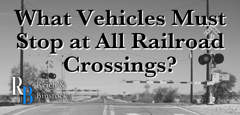 what vehicles must stop at all railroad crossings